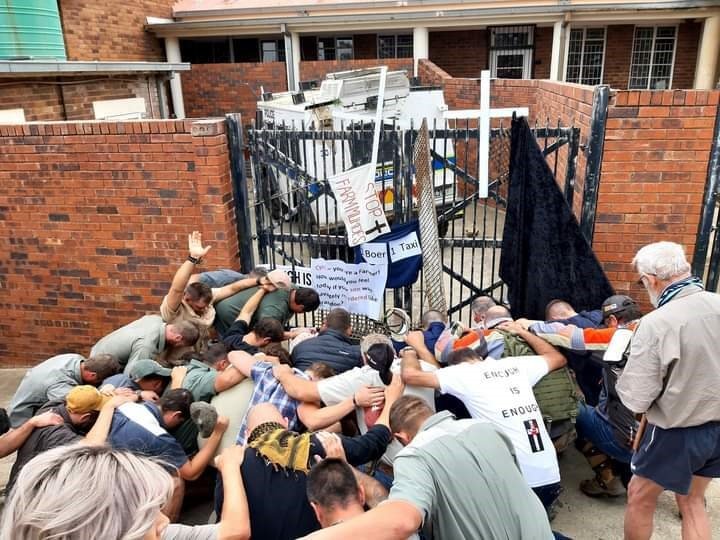 Tense scenes outside court.