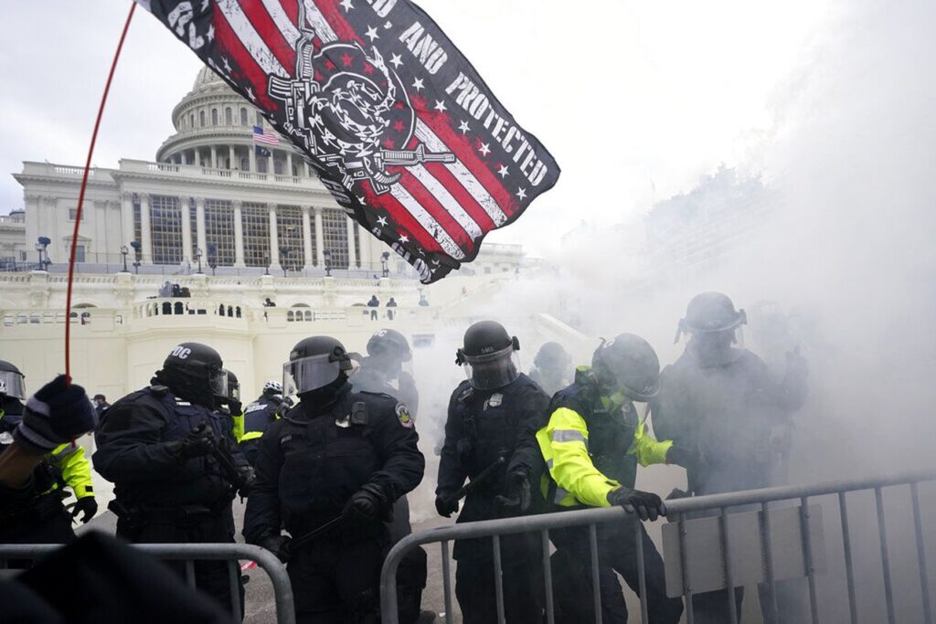 Police hold off Trump supporters