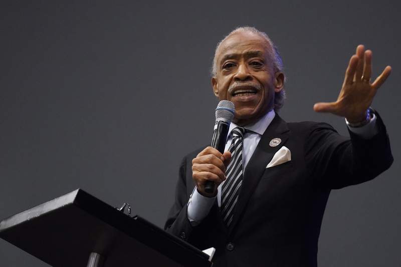 Black man's death fuels debate over police shooting at cars