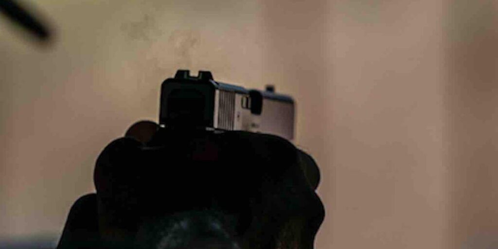 Intruder assaults homeowner, threatens to 'hurt' his wife, tries to force his way into house. But homeowner has handgun — and shoots intruder dead.