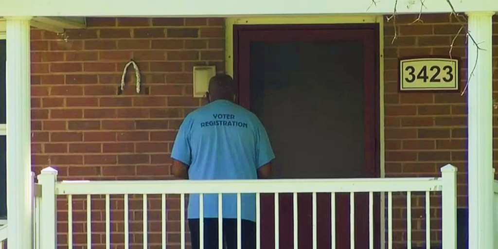Why is a Biden Door-to-Door Vax Pusher Wearing a ‘Voter Registration’ T-Shirt?