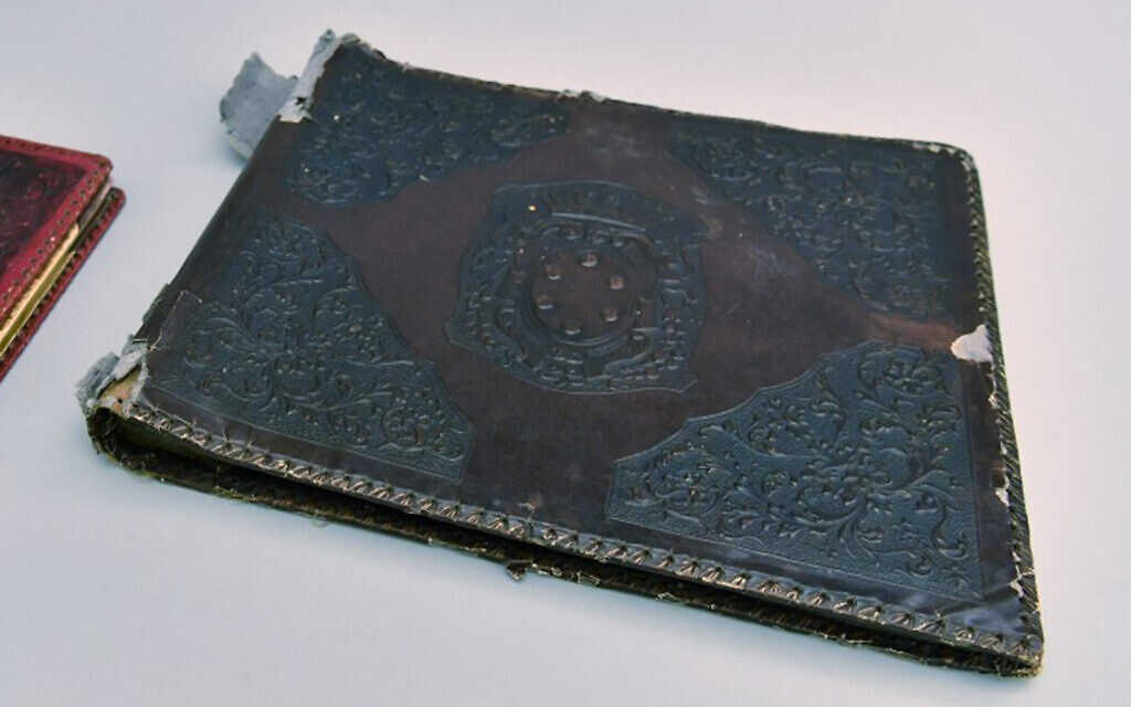 Researchers find Nazi photo album bound with human skin