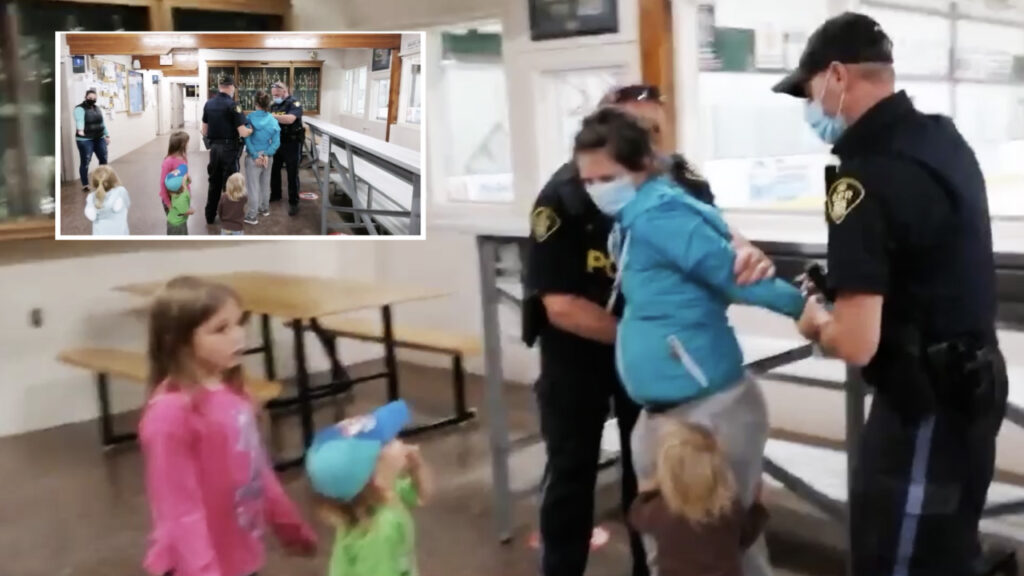 OPP arrest woman in front of crying children for not providing vaccination status to enter arena