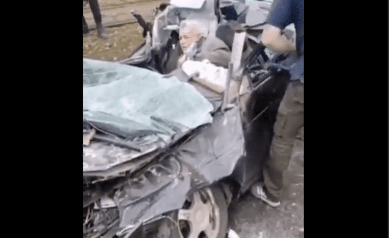 DISTURBING VIDEO: Ukrainian Men Try to Pry Elderly Man From His Vehicle After Armored Vehicle Intentionally Drives Over Him