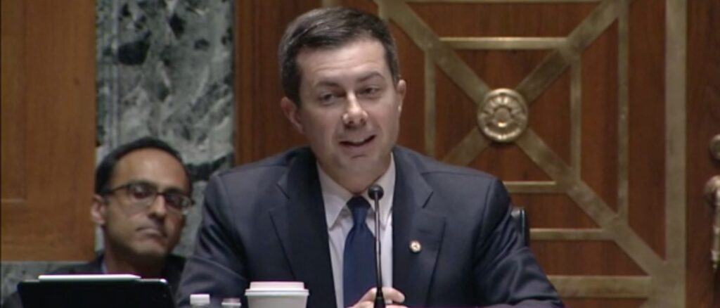 ‘Ludicrous’: Buttigieg Watches As Manchin Throws Cold Water On Biden’s EV Dreams