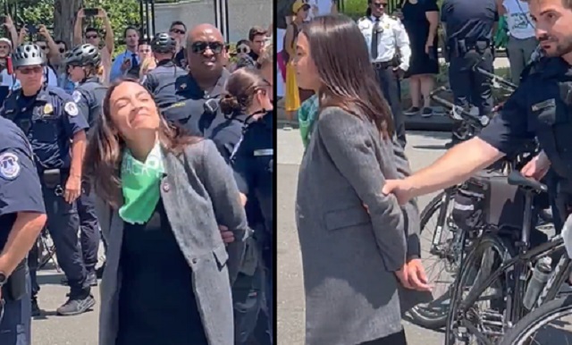 Squad Members 'Arrested' by Capitol Police For Blocking Traffic Outside Supreme Court, Pretend Like They're in Handcuffs