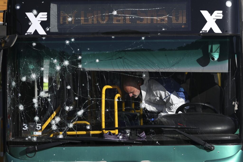 Twin blasts shake Jerusalem, killing teen and wounding 18