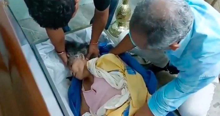 SHOCKING: Woman Believed to be Dead Wakes During Funeral and Bangs on Inside of Coffin [VIDEO]