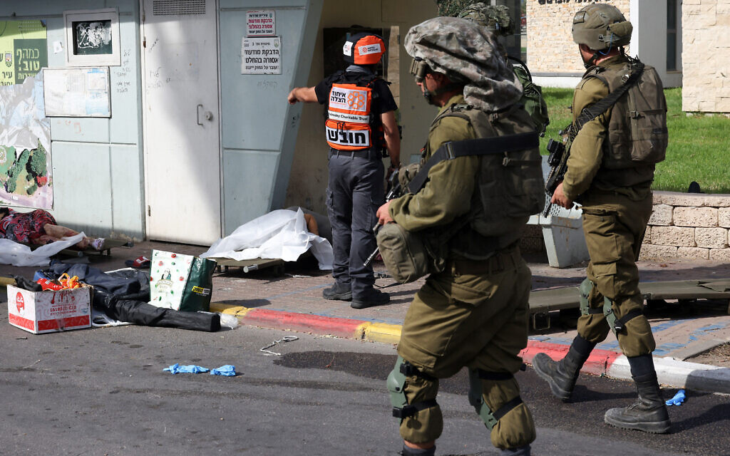 Footage of Hamas assault on civilians shows likely war crimes, experts say