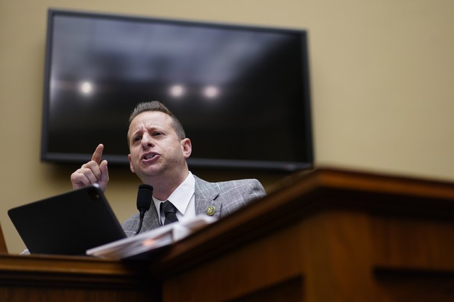 'Immature:' Democrat Wears Putin Mask to Impeachment Hearing On Biden's Shady Business Dealings