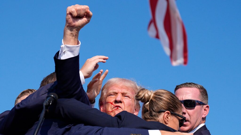 Gunshots reportedly fired at Donald Trump rally - as former president rushed off stage