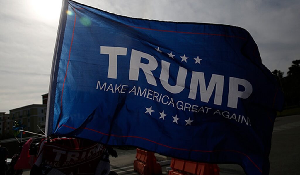 Anti-Trump Clown Spits on Pro-Trump Flag and Then Got Hit With Instant Karma