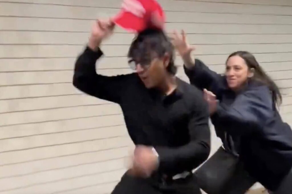 WATCH: Liberal Faceplants While Trying To Steal Man’s MAGA Hat
