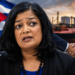 Representative Pramila Jayapal speaking at a microphone with a Cuban flag, oil tanker, and diplomatic handshake scene in the background, symbolizing controversy surrounding Cuba sanctions and foreign policy negotiations.